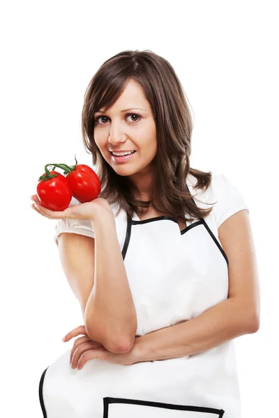 Mujer joven con tomates —  Fotos de Stock