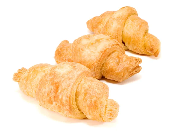 Three Croissants on background — Stock Photo, Image