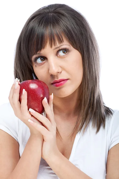 Junge Frau isst roten Apfel — Stockfoto