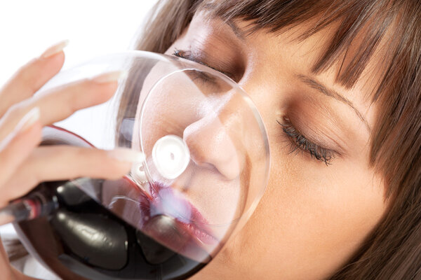 Young woman drinking red wine