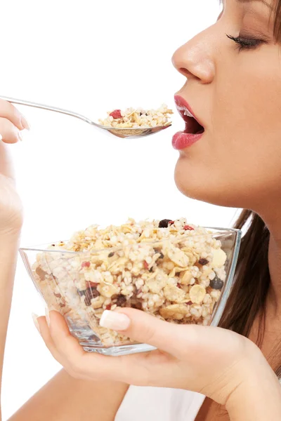 Young woman eating cereal breakfast — Stock Photo, Image