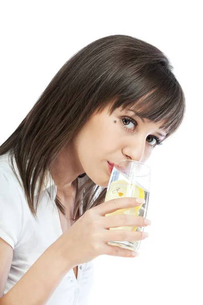 Woman drinking water with lemon — Stock Photo, Image