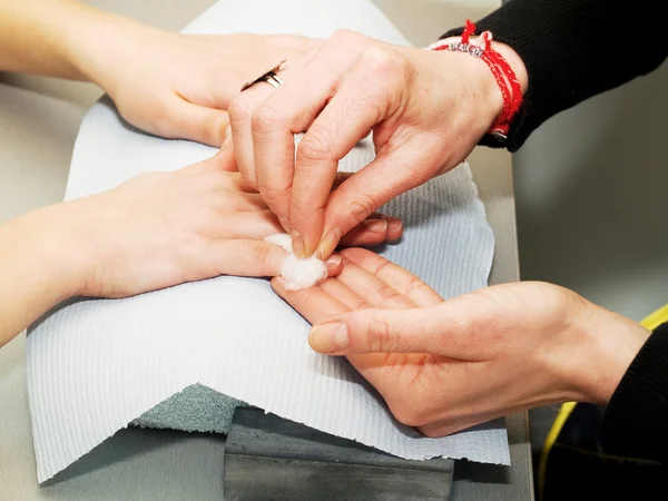 Girl fingernails being manicured. — Stock Photo, Image