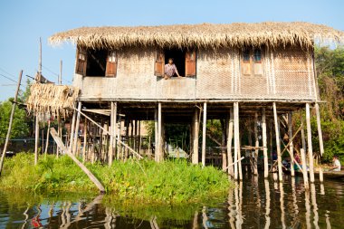 man looking through the window in Myanmar