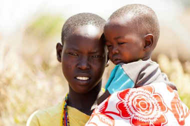 young masai woman with a baby