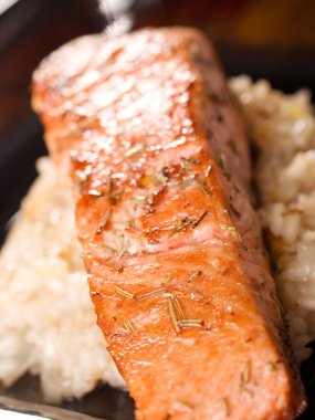 Salmon with capers sauce clipart