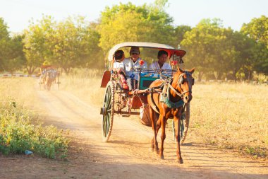 Tourists enjoying a ride with horse