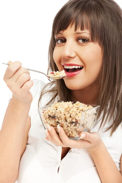 Young woman eating cereal breakfast — Stock Photo, Image