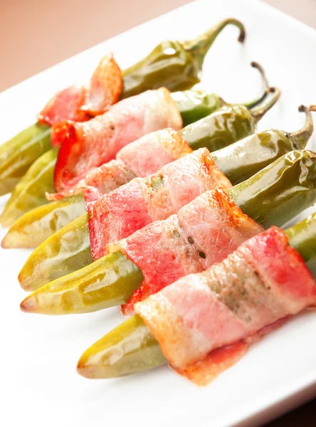 Grilled jalapenos wrapped in bacon — Stock Photo, Image