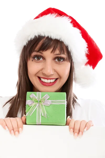 Mujer con Santa Sombrero y Regalo de Navidad — Foto de Stock