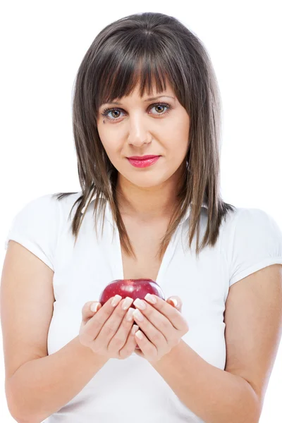 Νεαρή γυναίκα τρώει κόκκινο μήλο — Φωτογραφία Αρχείου