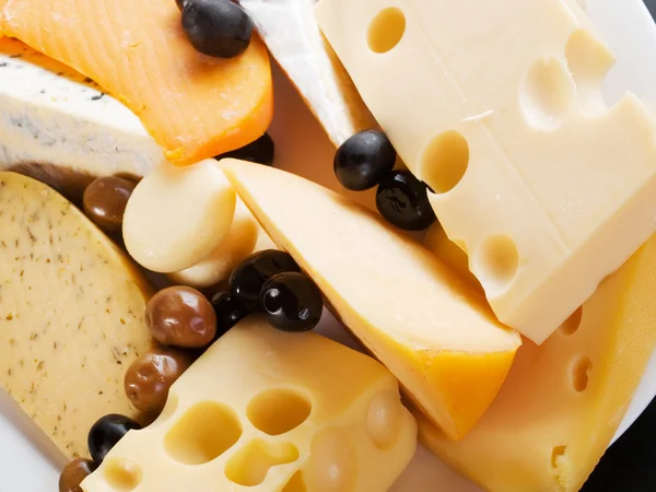 Cheese still life on background — Stock Photo, Image