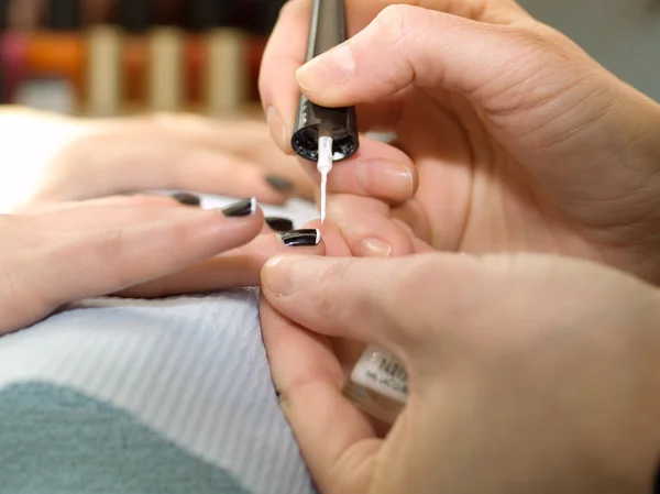 Girl fingernails being manicured. — Stock Photo, Image