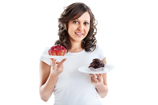 Young woman with two cakes — Stock Photo, Image