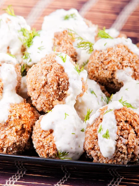 Meatballs with white sauce — Stock Photo, Image