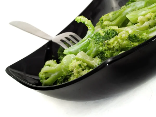 Brocoli avec crème sur fond — Photo