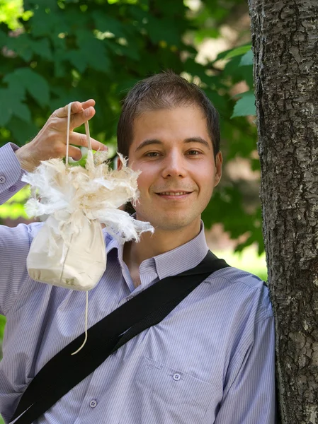 Man with Bride's Handbag — Stock Photo, Image