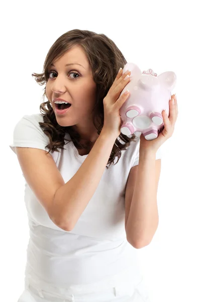 Donna che tiene la scatola dei soldi del maiale — Foto Stock