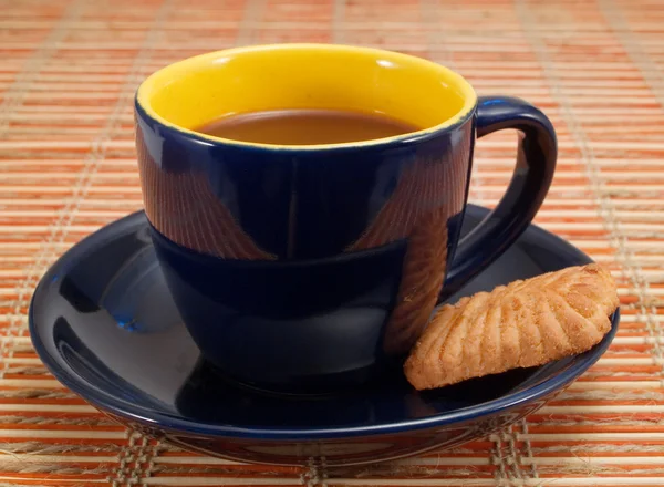 Taza de café en el fondo — Foto de Stock