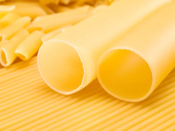 Raw Pasta on background — Stock Photo, Image