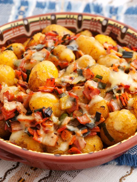 Baked potatoes with ham and cheese — Stock Photo, Image