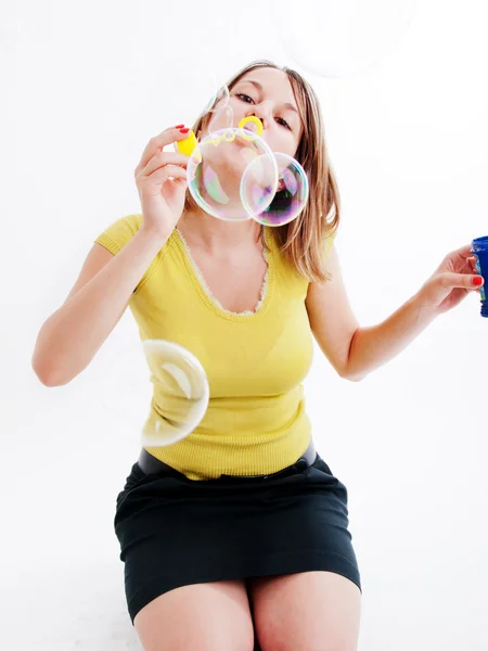 Girl blowing bubbles — Stock Photo, Image