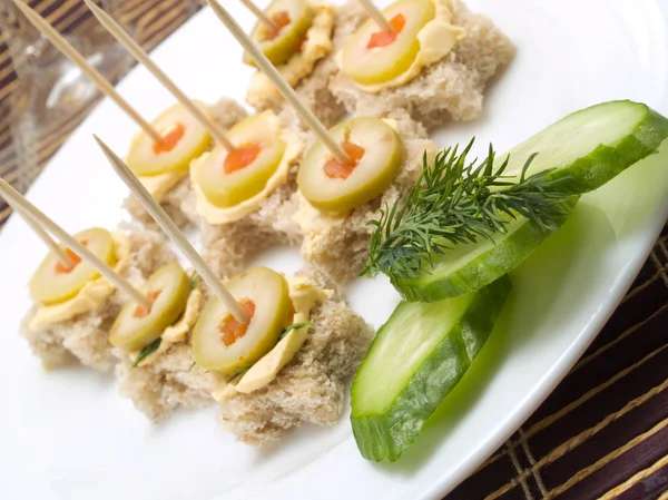 Tasty Appetizers  on background — Stock Photo, Image