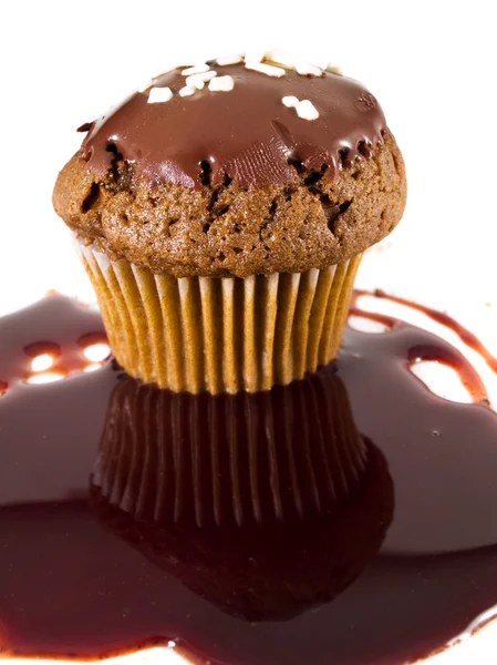 Čokoládový Muffin na pozadí Royalty Free Stock Obrázky