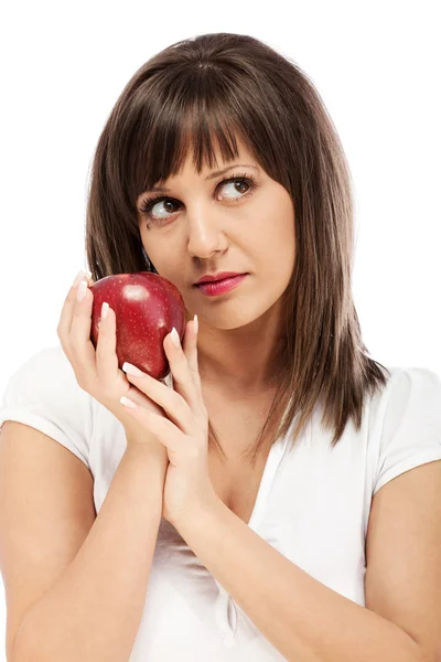 Young woman eating red apple Royalty Free Stock Images