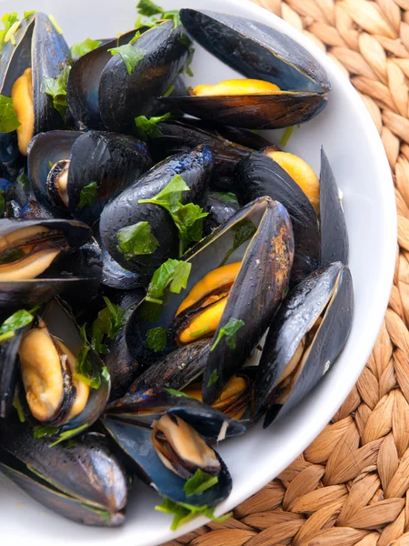 Mussels with butter and fresh herbs Royalty Free Stock Images