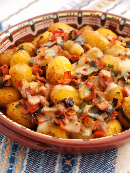 Baked potatoes with ham and cheese — Stock Photo, Image