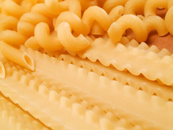 Rohe Pasta auf Hintergrund — Stockfoto
