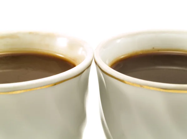 Tazas de café en el fondo — Foto de Stock