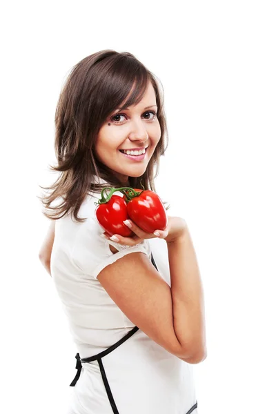 Молодая женщина с помидорами — стоковое фото