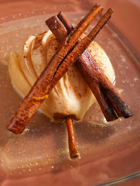 Pears in rum with cinnamon — Stock Photo, Image