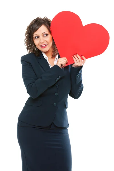 Businesswoman holding red paper heart — Stock Photo, Image