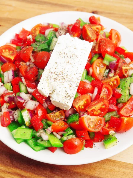 Greek salad on background — Stock Photo, Image