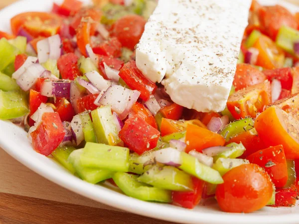 Greek salad on background — Stock Photo, Image