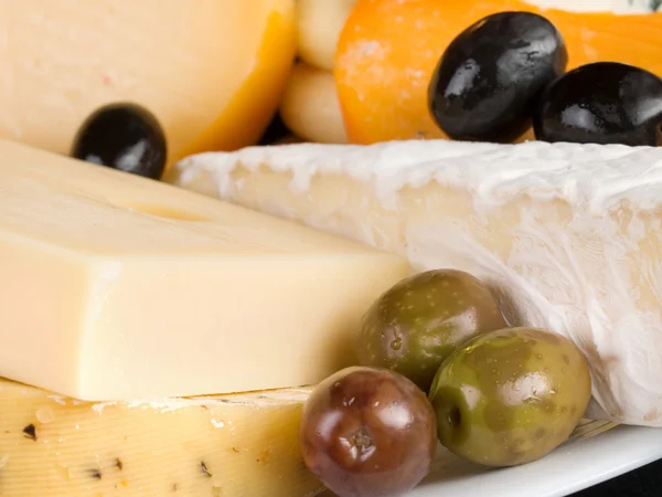 Cheese still life on background — Stock Photo, Image