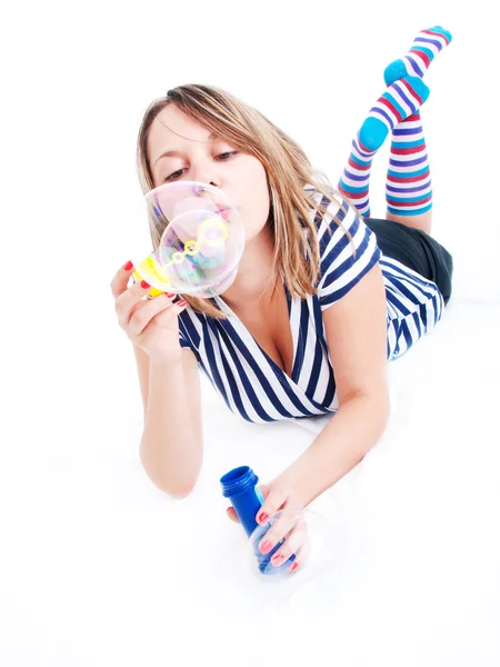 Girl blowing bubbles — Stock Photo, Image