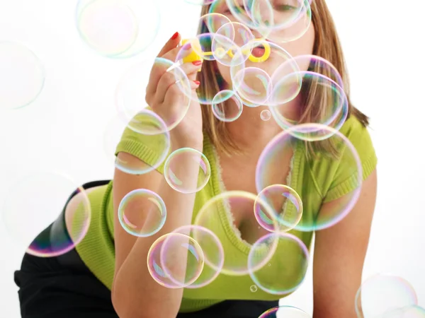 Girl blowing bubbles — Stock Photo, Image