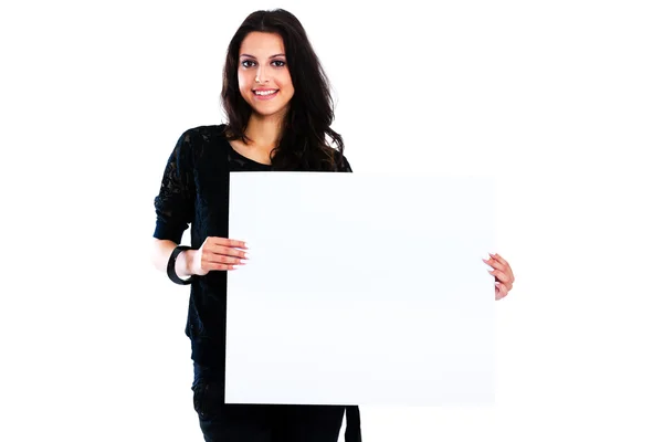 Joven mujer sosteniendo tablero en blanco — Foto de Stock