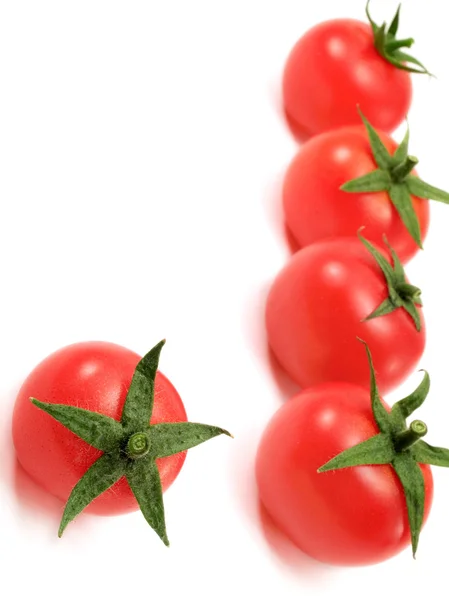 Cherry tomaten op achtergrond — Stockfoto