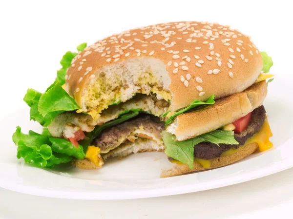 Hamburger with steak, cheese, tomatoes — Stock Photo, Image