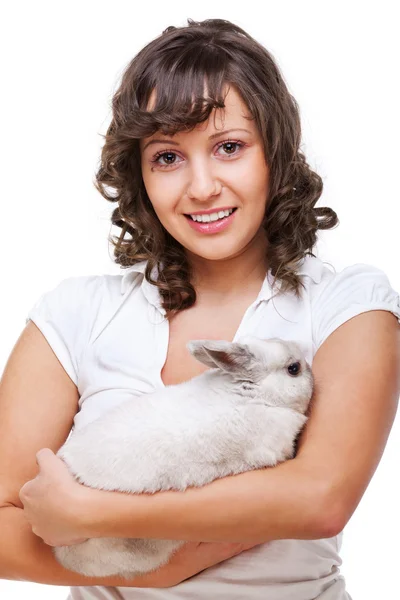 Mujer joven y conejo — Foto de Stock