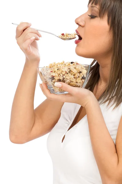 Jovem mulher comendo café da manhã de cereais — Fotografia de Stock