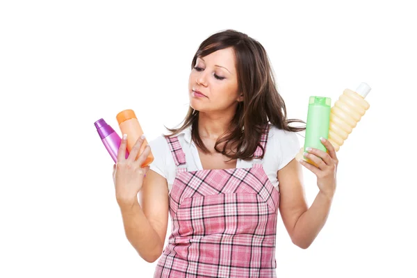 Mujer joven con cosméticos — Foto de Stock