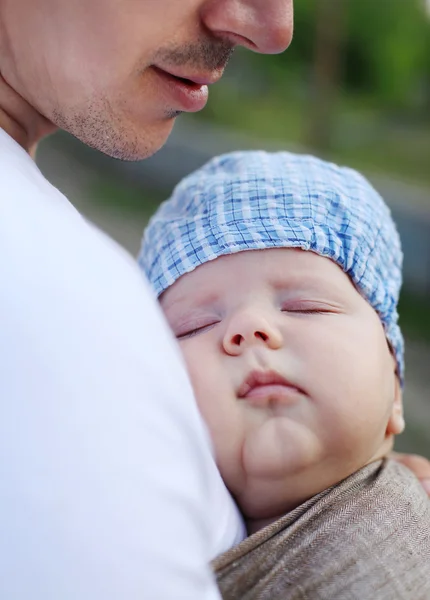 Sleeping baby boy in sling — Stock Photo, Image