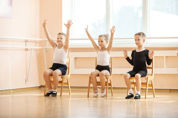 Young dancers playing or doing exercise — Stock Photo, Image