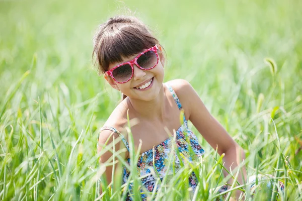 Cheerful girl in sunglasses — Stock Photo, Image